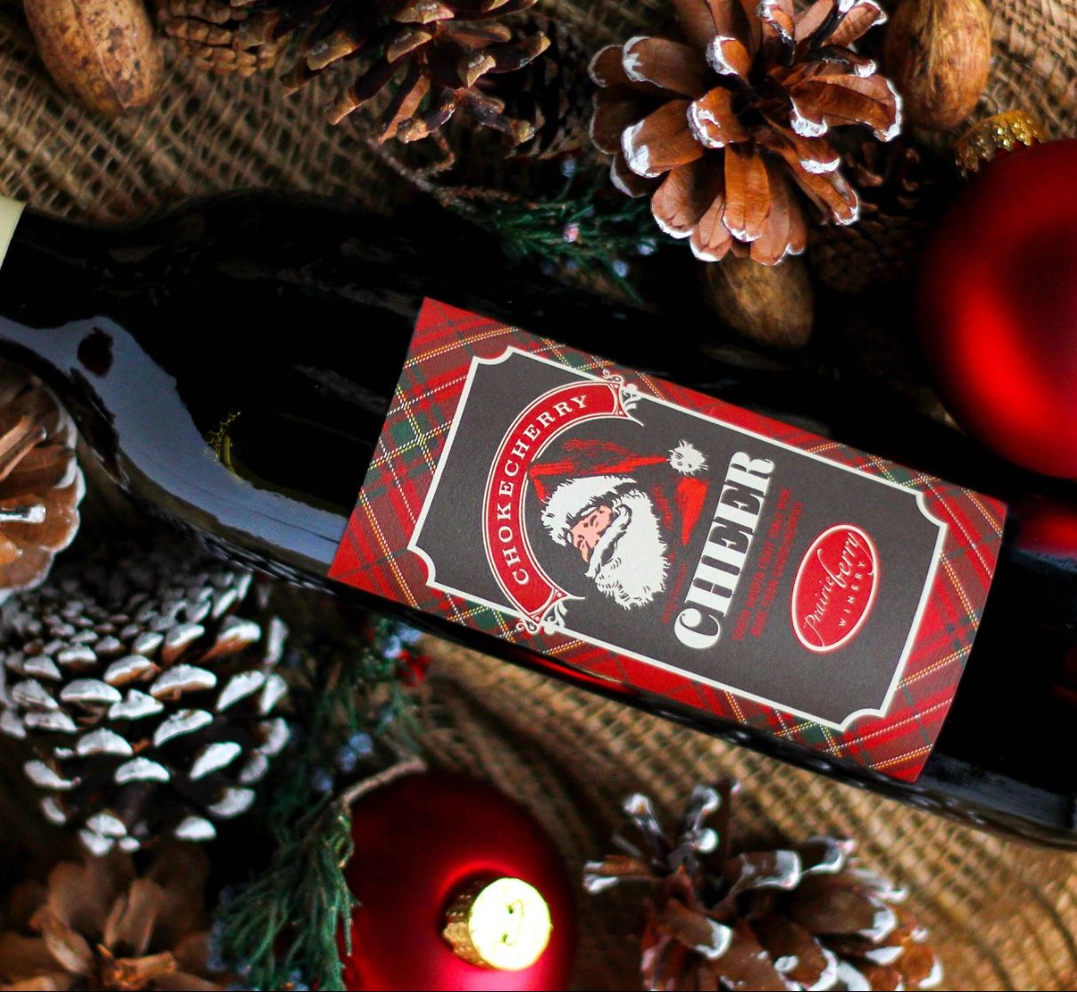 Chokecherry Cheer A bottle of Chokecherry Cheer, a sweet holiday wine made by Prairie Berry Winery in Hill City, South Dakota