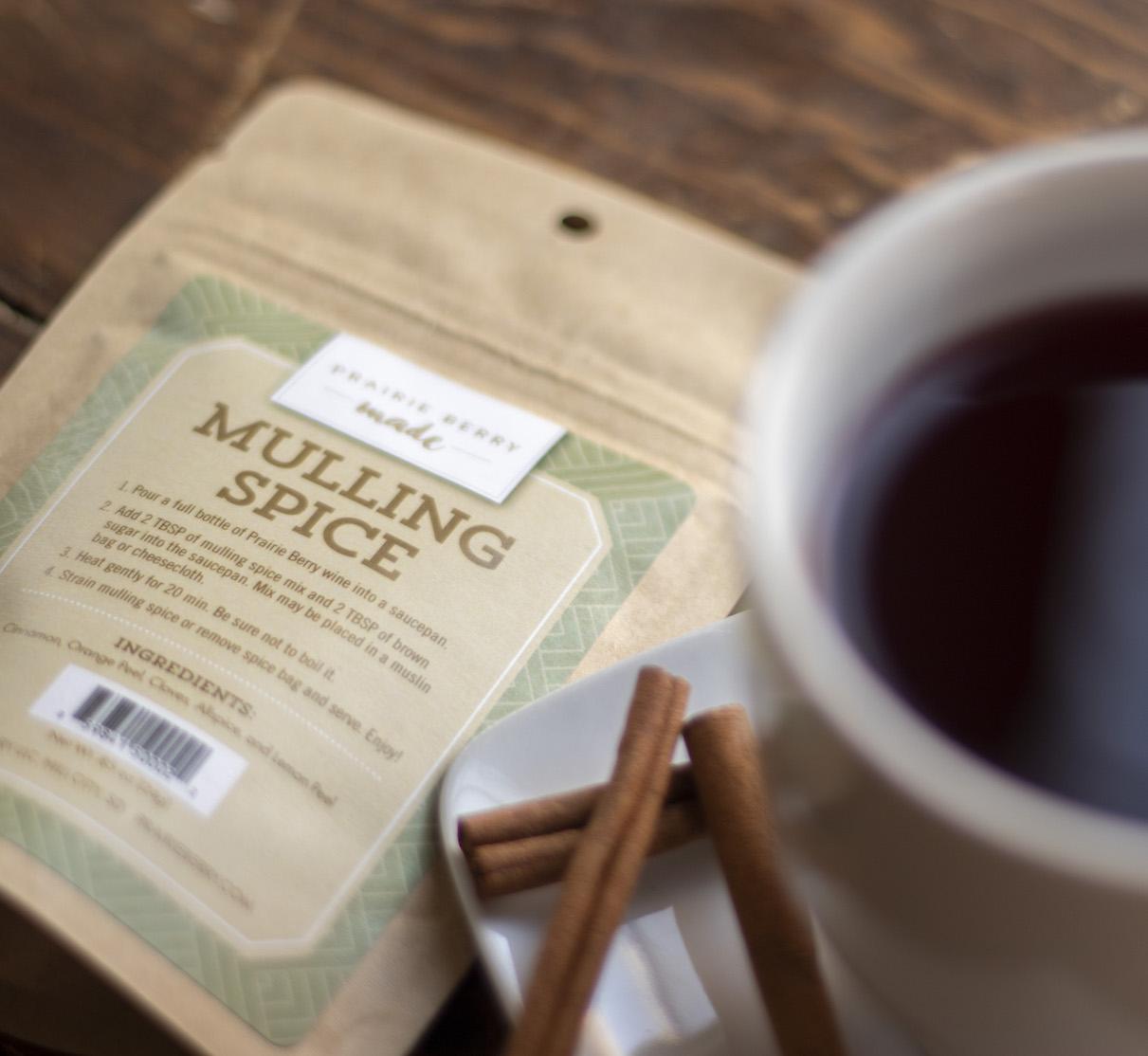 prairie berry made mulling spice new package A packet of Prairie Berry Made Mulling Spice next to a mug of mulled wine