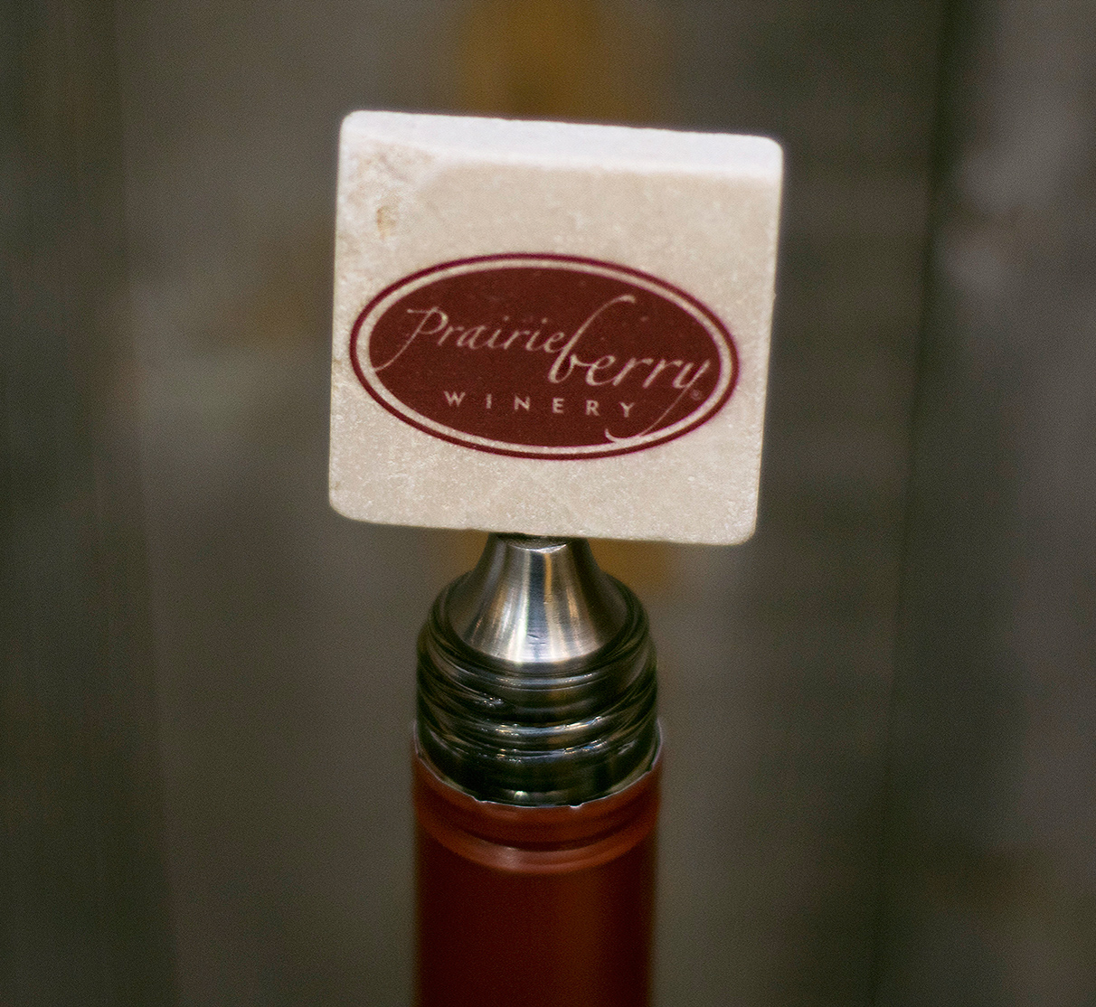 PBW-Stone-Bottle-Stopper Prairie Berry logo wine stopper